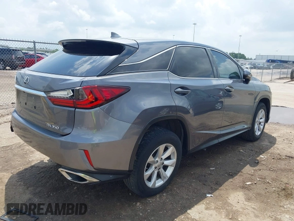 2016 Lexus RX 350 z VIN 2T2ZZMCAXGC031079, wystawiony jako IAAI lot #42120190 z przebiegiem 142 407 mil mil oraz . Historia ofert i sprzedaży dostępna na DreamBid. Obrazek 4.