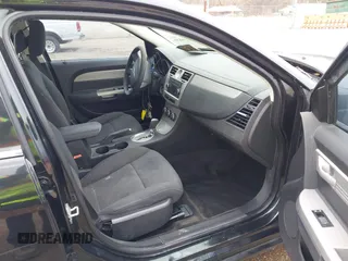 2010 Chrysler Sebring Touring z VIN 1C3CC4FB5AN226242, wystawiony jako IAAI lot #41451830 z przebiegiem 246 121 mil mil oraz . Historia ofert i sprzedaży dostępna na DreamBid. Obrazek 5.