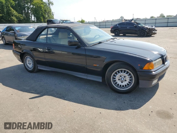 1995 BMW 3 Series 318iC with VIN WBABK5321SEC84192, listed as a Copart auction lot 69299564 with 199,105 mi miles and Salvage Title. Bid and sale history available at carsss.com. Image 4.