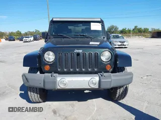 2012 Jeep Wrangler Arctic with VIN 1C4AJWBG7CL170079, listed as a IAAI auction lot 41004260 with 83,408 mi miles and . Bid and sale history available at DreamBid. Image 12.
