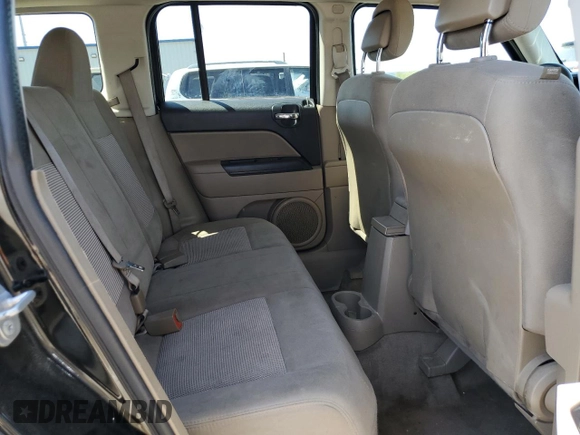 2014 Jeep Patriot Altitude with VIN 1C4NJPBA2ED851122, listed as a Copart auction lot 52588795 with 160,258 mi miles and Salvage Title. Bid and sale history available at DreamBid. Image 11.