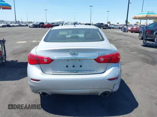 2015 Infiniti Q50 Premium with VIN JN1BV7AP8FM339334, listed as a IAAI auction lot 41956950 with 99,945 mi miles. Bid and sale history available at carsss.com. Image 16.