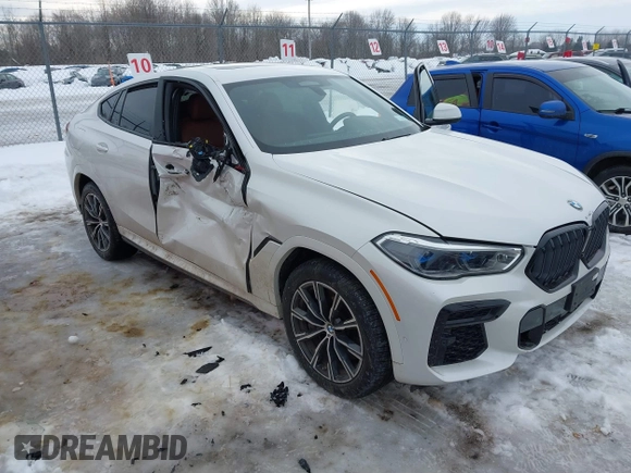 2023 BMW X6 M50i with VIN 5UXCY8C02P9N80310, listed as a IAAI auction lot 41619497 with 19,686 mi miles. Bid and sale history available at carsss.com. Image 1.