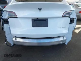 2024 Tesla Model Y Long Range with VIN 7SAYGDEE5RA222333, listed as a IAAI auction lot 41944404 with 12,176 mi miles. Bid and sale history available at carsss.com. Image 6.