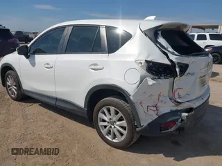2013 Mazda CX-5 Sport z VIN JM3KE2BE5D0135213, wystawiony jako IAAI lot #42270730 z przebiegiem 140 917 mil mil oraz . Historia ofert i sprzedaży dostępna na DreamBid. Obrazek 3.