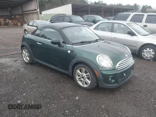 2012 MINI Coupe z VIN WMWSX1C57CT300183, wystawiony jako IAAI lot #41514629 z przebiegiem 194 935 mil mil oraz . Historia ofert i sprzedaży dostępna na DreamBid. Obrazek 1.