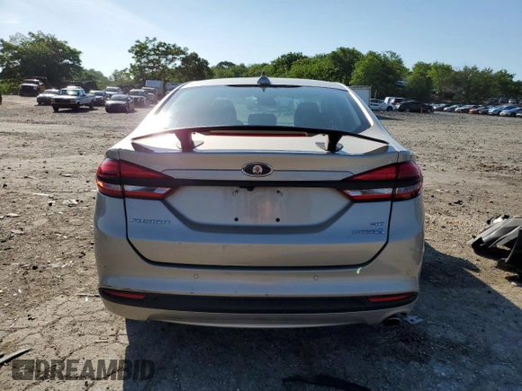 2018 Ford Fusion SE с VIN 3FA6P0LU4JR190543, выставлен на аукционе Copart как лот 56730095 с пробегом 15 166 миль миль и Списание • Salvage title. История ставок и продаж доступна на DreamBid. Изображение 6.