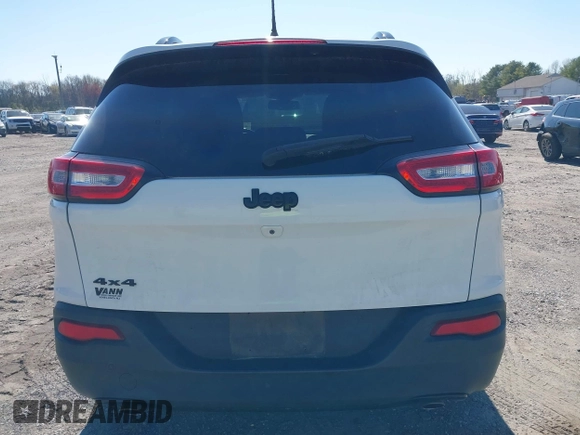 2014 Jeep Cherokee Latitude with VIN 1C4PJMCS9EW309289, listed as a IAAI auction lot 42003252 with 99,360 mi miles and . Bid and sale history available at DreamBid. Image 16.