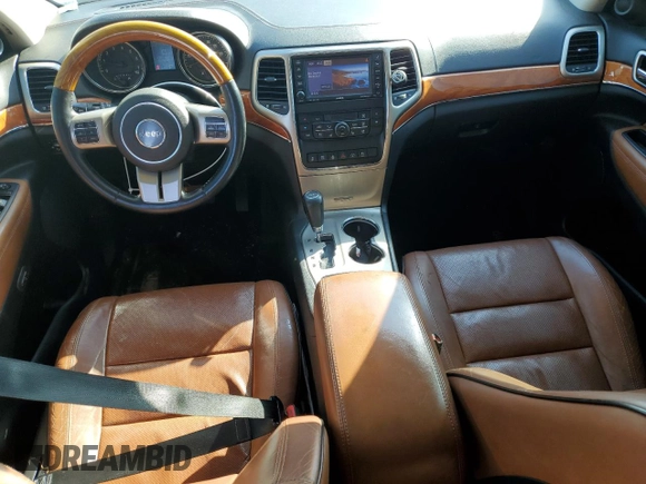 2013 Jeep Grand Cherokee Overland with VIN 1C4RJECT7DC588233, listed as a Copart auction lot 52672605 with 231,329 mi miles and Salvage Title. Bid and sale history available at carsss.com. Image 8.