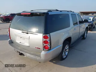 2014 GMC Yukon XL SLT with VIN 1GKS1KE09ER230704, listed as a IAAI auction lot 42046847 with 85,381 mi miles. Bid and sale history available at carsss.com. Image 4.