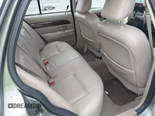 2004 Mercury Grand Marquis LS Premium z VIN 2MEHM75W64X654827, wystawiony jako IAAI lot #41890046 z przebiegiem Nie podano mil oraz . Historia ofert i sprzedaży dostępna na DreamBid. Obrazek 8.