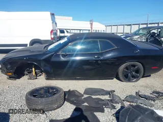2014 Dodge Challenger R/T Plus z VIN 2C3CDYBT2EH274265, wystawiony jako IAAI lot #41845052 z przebiegiem 120 290 mil mil oraz . Historia ofert i sprzedaży dostępna na DreamBid. Obrazek 14.