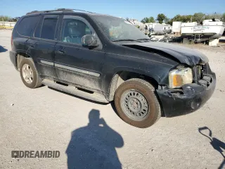 2002 GMC Envoy SLE with VIN 1GKDS13S022512481, listed as a Copart auction lot 74701454 with 0 mi miles and Salvage Title. Bid and sale history available at carsss.com. Image 4.