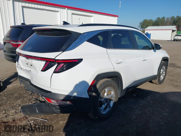 2022 Hyundai Tucson SEL with VIN KM8JB3AE8NU033575, listed as a IAAI auction lot 41662009 with 54,971 mi miles. Bid and sale history available at carsss.com. Image 4.