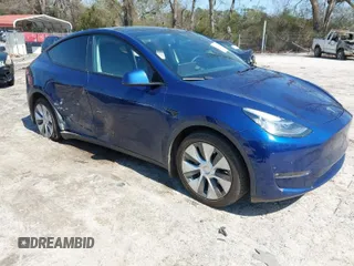 2021 Tesla Model Y Long Range with VIN 5YJYGAEE1MF207948, listed as a IAAI auction lot 41779570 with 100,859 mi miles. Bid and sale history available at carsss.com. Image 1.