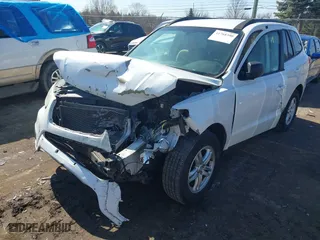 2012 Hyundai Santa Fe GLS with VIN 5XYZG3AB7CG145829, listed as a IAAI auction lot 41768390 with 143,972 mi miles. Bid and sale history available at carsss.com. Image 2.