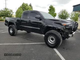 2022 Toyota Tacoma SR z VIN 3TYRZ5CN1NT016153, wystawiony jako Copart lot #56624785 z przebiegiem 88 633 mil mil oraz Czysty tytuł • Clean title. Historia ofert i sprzedaży dostępna na DreamBid. Obrazek 4.