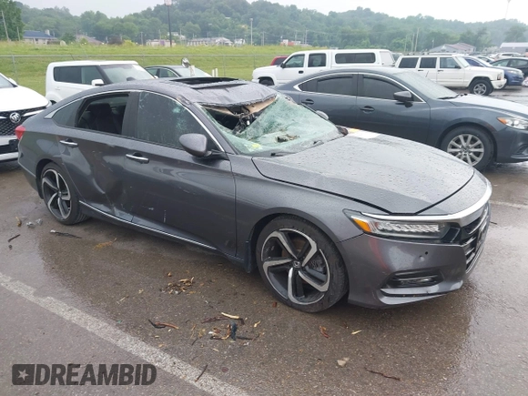 2018 Honda Accord Touring with VIN 1HGCV1F92JA005210, listed as a IAAI auction lot 42378040 with 69,294 mi miles and . Bid and sale history available at DreamBid. Image 1.