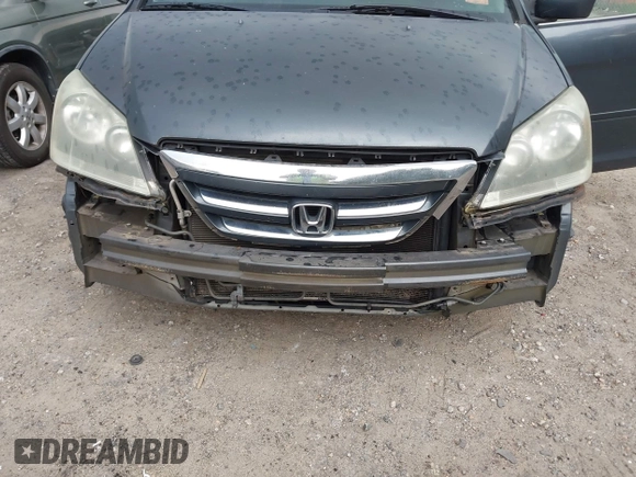 2006 Honda Odyssey EX-L z VIN 5FNRL38756B420817, wystawiony jako IAAI lot #42101271 z przebiegiem 203 892 mil mil oraz . Historia ofert i sprzedaży dostępna na DreamBid. Obrazek 6.