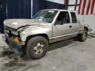 1998 Chevrolet Silverado 1500 with VIN 2GCEK19R9W1105382, listed as a Copart auction lot 87264814 with 290,006 mi miles and Salvage Title. Bid and sale history available at DreamBid. Image 1.