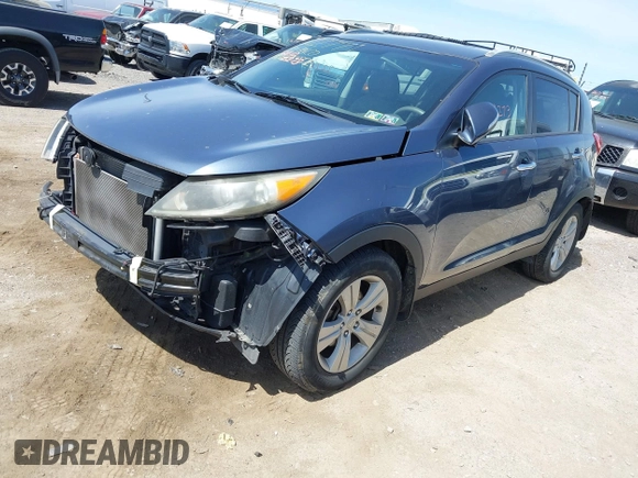 2013 Kia Sportage LX with VIN KNDPB3A27D7395592, listed as a IAAI auction lot 42102273 with 87,991 mi miles and . Bid and sale history available at DreamBid. Image 2.