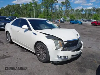 2013 Cadillac CTS Performance with VIN 1G6DK5E37D0138249, listed as a IAAI auction lot 41991166 with 121,133 mi miles and . Bid and sale history available at DreamBid. Image 1.