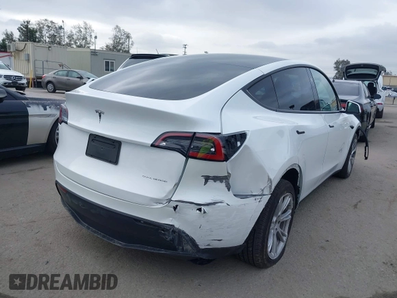 2024 Tesla Model Y Long Range with VIN 7SAYGDEEXRF059620, listed as a IAAI auction lot 42190425 with 16,682 mi miles. Bid and sale history available at carsss.com. Image 4.
