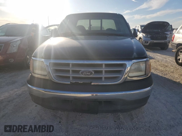 1999 Ford F-250 with VIN 1FTRX27L8XNB35593, listed as a Copart auction lot 77008354 with Not provided miles and Salvage title. Bid and sale history available at DreamBid. Image 5.