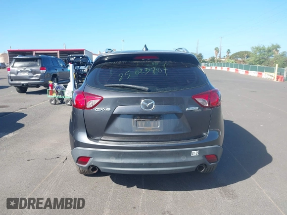 2014 Mazda CX-5 Sport with VIN JM3KE2BE4E0414721, listed as a IAAI auction lot 41408914 with Not Provided miles and . Bid and sale history available at carsss.com. Image 16.