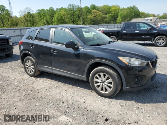 2015 Mazda CX-5 Touring with VIN JM3KE4CY6F0434538, listed as a Copart auction lot 54966145 with 209,447 mi miles and Clean Title. Bid and sale history available at DreamBid. Image 4.
