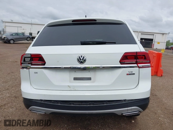 2019 Volkswagen Atlas SE with VIN 1V2UR2CA0KC560799, listed as a IAAI auction lot 42318671 with 95,804 mi miles and . Bid and sale history available at DreamBid. Image 16.