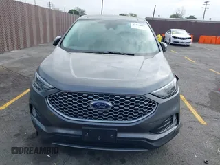 2023 Ford Edge SEL z VIN 2FMPK4J98PBA03830, wystawiony jako IAAI lot #41992054 z przebiegiem 21 081 mil mil oraz . Historia ofert i sprzedaży dostępna na DreamBid. Obrazek 12.