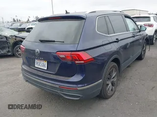 2022 Volkswagen Tiguan SE with VIN 3VV3B7AX0NM018659, listed as a IAAI auction lot 42076655 with 32,326 mi miles and . Bid and sale history available at DreamBid. Image 4.