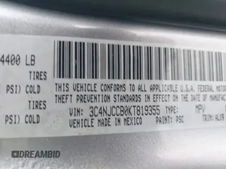 2019 Jeep Compass Limited with VIN 3C4NJCCB0KT819355, listed as a IAAI auction lot 41304561 with 69,892 mi miles. Bid and sale history available at carsss.com. Image 9.