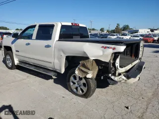2015 Chevrolet Silverado 1500 High Country with VIN 3GCUKTEJ2FG328037, listed as a Copart auction lot 77574804 with 69,011 mi miles and Salvage Title. Bid and sale history available at carsss.com. Image 2.