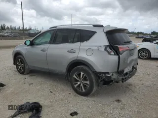 2018 Toyota RAV4 XLE with VIN 2T3WFREV4JW444884, listed as a Copart auction lot 55666275 with 174,275 mi miles and Salvage Title. Bid and sale history available at DreamBid. Image 2.