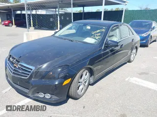 2010 Mercedes-Benz E-Class E 550 Luxury with VIN WDDHF9AB0AA136555, listed as a IAAI auction lot 42069576 with 129,775 mi miles. Bid and sale history available at carsss.com. Image 2.