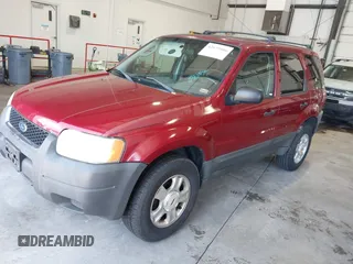 2004 Ford Escape XLT with VIN 1FMYU031X4KA86449, listed as a IAAI auction lot 42629506 with 231,115 mi miles and . Bid and sale history available at DreamBid. Image 2.