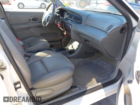 1998 Mercury Mystique z VIN 1MEFM66L2WK653881, wystawiony jako IAAI lot #41807702 z przebiegiem 119 158 mil mil oraz . Historia ofert i sprzedaży dostępna na DreamBid. Obrazek 5.