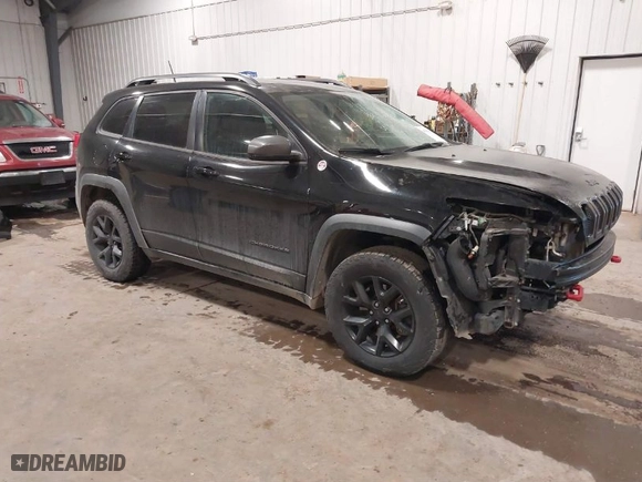 2017 Jeep Cherokee Trailhawk with VIN 1C4PJMBS8HW648454, listed as a IAAI auction lot 41094103 with 125,941 mi miles. Bid and sale history available at carsss.com. Image 1.