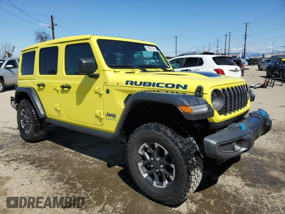 2024 Jeep Wrangler Rubicon z VIN 1C4RJXR64RW193946, wystawiony jako Copart lot #51693105 z przebiegiem 4 863 mil mil oraz Szkoda całkowita • Salvage title. Historia ofert i sprzedaży dostępna na DreamBid. Obrazek 4.