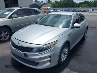 2017 Kia Optima LX with VIN 5XXGT4L34HG122891, listed as a IAAI auction lot 42468125 with 161,908 mi miles and . Bid and sale history available at DreamBid. Image 2.