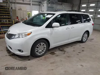 2015 Toyota Sienna XLE with VIN 5TDYK3DC8FS598525, listed as a IAAI auction lot 41918825 with 128,557 mi miles. Bid and sale history available at carsss.com. Image 2.