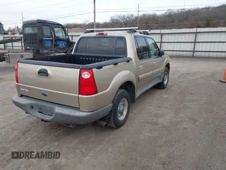 2001 Ford Explorer Sport Trac z VIN 1FMZU77E71UB38985, wystawiony jako IAAI lot #41950927 z przebiegiem 283 235 mil mil oraz . Historia ofert i sprzedaży dostępna na DreamBid. Obrazek 4.