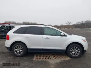 2014 Ford Edge SEL with VIN 2FMDK3J90EBA09244, listed as a IAAI auction lot 41548349 with 125,429 mi miles. Bid and sale history available at carsss.com. Image 13.