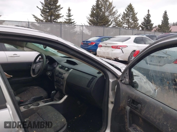 2009 Ford Focus SE z VIN 1FAHP35N89W154055, wystawiony jako IAAI lot #41680350 z przebiegiem 165 476 mil mil oraz . Historia ofert i sprzedaży dostępna na DreamBid. Obrazek 5.