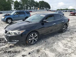 2017 Nissan Maxima Platinum with VIN 1N4AA6AP7HC388070, listed as a Copart auction lot 61038595 with 121,738 mi miles and Salvage title. Bid and sale history available at DreamBid. Image 1.