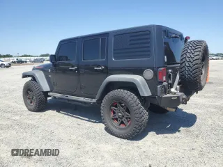 2012 Jeep Wrangler Unlimited Call of Duty MW3 with VIN 1C4BJWFGXCL148883, listed as a Copart auction lot 53162705 with 111,900 mi miles and Salvage title. Bid and sale history available at DreamBid. Image 2.