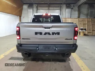2022 Ram 1500 Rebel z VIN 1C6SRFLT1NN258780, wystawiony jako Copart lot #53040405 z przebiegiem 27 307 mil mil oraz Szkoda całkowita • Salvage title. Historia ofert i sprzedaży dostępna na DreamBid. Obrazek 6.