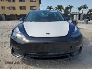 2023 Tesla Model 3 z VIN 5YJ3E1EA3PF434205, wystawiony jako Copart lot #57917305 z przebiegiem 82 481 mil mil oraz Szkody całkowita. Historia ofert i sprzedaży dostępna na DreamBid. Obrazek 5.